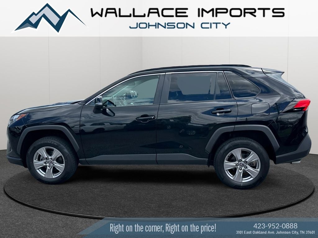 2023 Toyota RAV4 XLE in Midnight Black Metallic — front three-quarter view