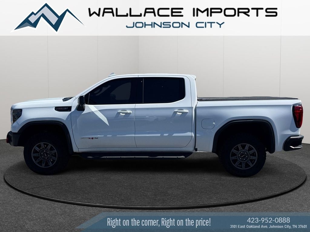 2025 GMC Sierra 1500 AT4X in Summit White — front three-quarter view