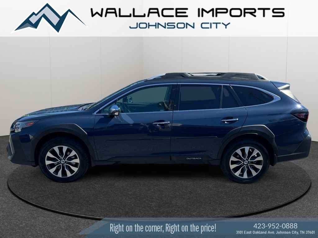 2023 Subaru Outback Touring XT in Cosmic Blue — front three-quarter view
